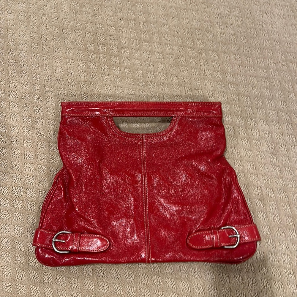 Christopher Kon red leather clutch bag